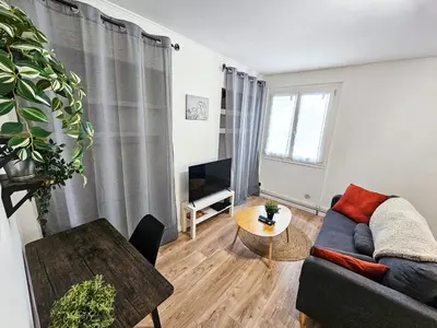 Coin salon dans l'établissement Beau T1 2 personnes BERGSON
