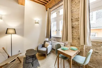 Coin salon dans l'établissement All in Lyon | Studio de charme au cœur de Lyon