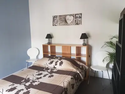Un ou plusieurs lits dans un hébergement de l'établissement Chambre d'Hôtes La Rose des Vents