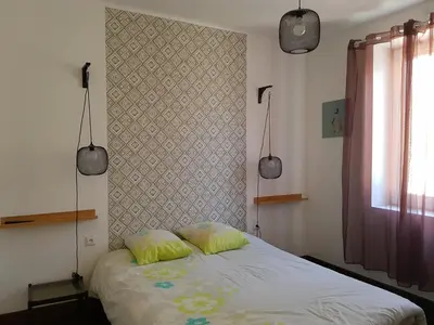 Un ou plusieurs lits dans un hébergement de l'établissement Chambre d'Hôtes La Rose des Vents