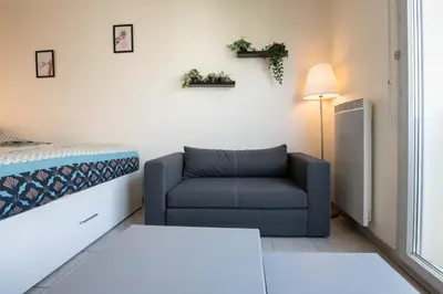 Coin salon dans l'établissement Le Gaïa - Joli appartement au calme 10min du centre de Lyon