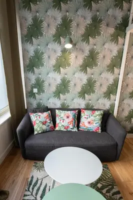 Coin salon dans l'établissement Le Canopée - Beau studio atypique quais du Rhône