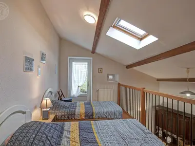 Un ou plusieurs lits dans un hébergement de l'établissement Gîte Authentique avec Wifi et Cheminée à Véranne - FR-1-496-256