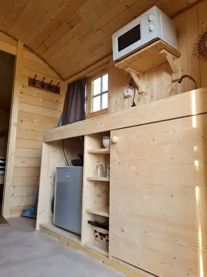 Cuisine ou kitchenette dans l'établissement LES ROULOTTES DU PILAT
