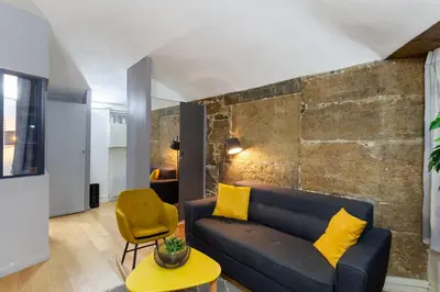 Coin salon dans l'établissement Midoon guest - LA VERRIERE DES TERREAUX - Lyon 1er
