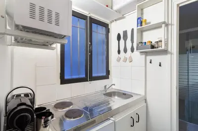 Cuisine ou kitchenette dans l'établissement Midoon guest - LA VERRIERE DES TERREAUX - Lyon 1er