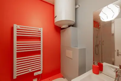 Salle de bains dans l'établissement HONORÊ SUITE FERRANDIERE