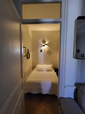 Un ou plusieurs lits dans un hébergement de l'établissement Appartement Lyon 6 Tête d'Or