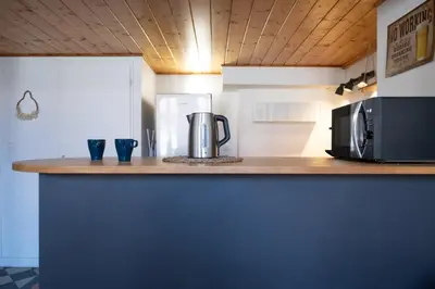 Cuisine ou kitchenette dans l'établissement L'Indigo- Coup de coeur Canut - Croix Rousse