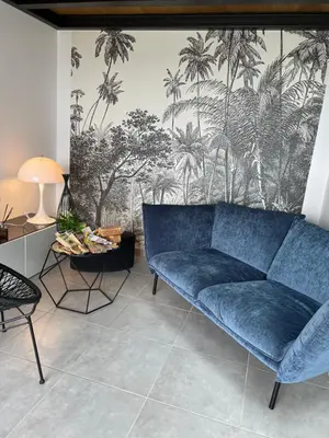 Coin salon dans l'établissement Appart & Fleurinoise balcon ascenseur climatisation
