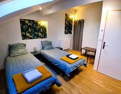 Un ou plusieurs lits dans un hébergement de l'établissement T4 en duplex, résidence atypique en pleine forêt