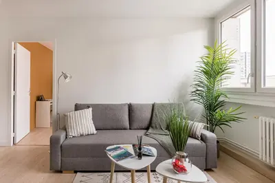 Coin salon dans l'établissement APPART COSY - COMME À LA MAISON - ST ETIENNE