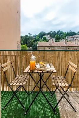 Balcon ou terrasse dans l'établissement APPART COSY - COMME À LA MAISON - ST ETIENNE
