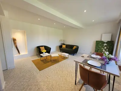 Coin salon dans l'établissement LODGES EN PIERRES DOREES