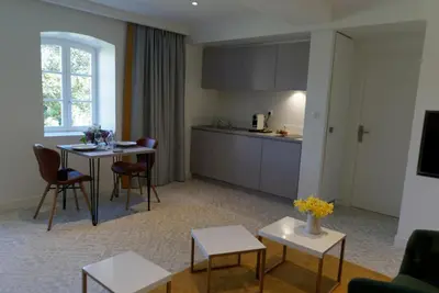Cuisine ou kitchenette dans l'établissement LODGES EN PIERRES DOREES