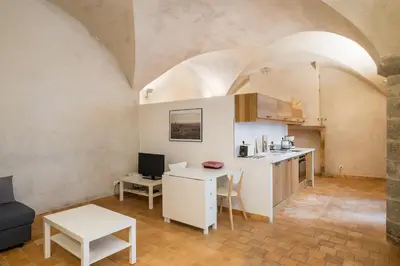 Cuisine ou kitchenette dans l'établissement Honorê - Suite Romain Rolland