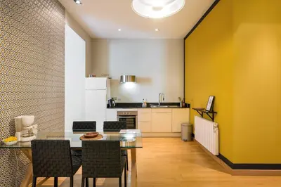 Cuisine ou kitchenette dans l'établissement Honorê - Suites Bellecour