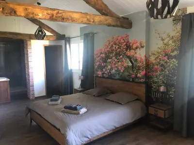 Un ou plusieurs lits dans un hébergement de l'établissement Au Clair de la Pierre - Chambres d'hôtes