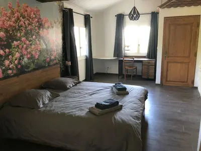 Un ou plusieurs lits dans un hébergement de l'établissement Au Clair de la Pierre - Chambres d'hôtes