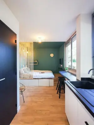 Cuisine ou kitchenette dans l'établissement Le lodge de Fourvière