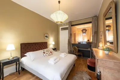 Un ou plusieurs lits dans un hébergement de l'établissement LE SHERWOOD - Magnifique T3 avec bureau