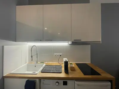 Cuisine ou kitchenette dans l'établissement Time Capsule - Studio cosy