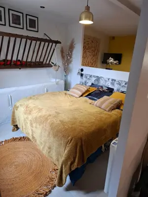 Un ou plusieurs lits dans un hébergement de l'établissement Le gîte des Pierres Dorées