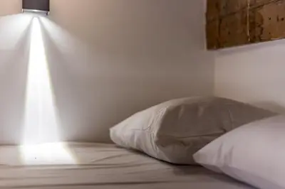 Un ou plusieurs lits dans un hébergement de l'établissement All in Lyon | Studio cosy Presqu’île de Lyon