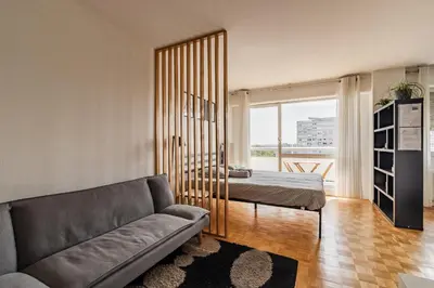 Coin salon dans l'établissement T1 Confort Tête d'Or Doua - Parking Gratuit