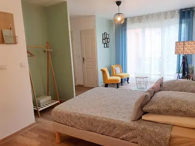 Un ou plusieurs lits dans un hébergement de l'établissement Studio fonctionnel au calme avec garage individuel et balcon