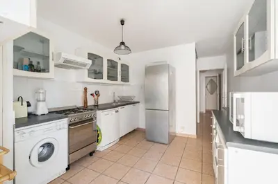 Cuisine ou kitchenette dans l'établissement Nice Apartment with Parking balcon Casa Lyon