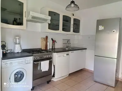 Cuisine ou kitchenette dans l'établissement Nice Apartment with Parking balcon Casa Lyon