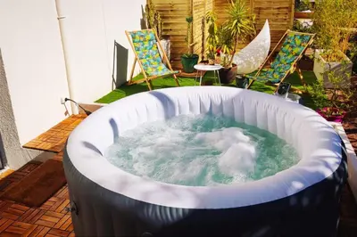 Plan de l'établissement Superbe appartement avec jacuzzi avec jardin privé