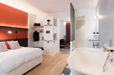 Un ou plusieurs lits dans un hébergement de l'établissement MiHotel Charité