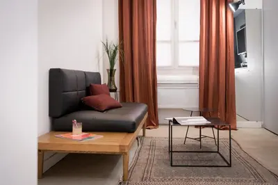 Coin salon dans l'établissement MiHotel Charité