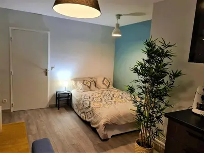 Un ou plusieurs lits dans un hébergement de l'établissement Grand Studio Lyon Villeurbanne Proche Metro - Wifi