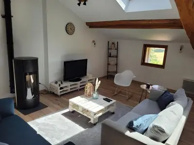 Télévision ou salle de divertissement dans l'établissement Le cœur des Dombes