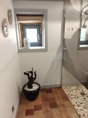 Salle de bains dans l'établissement La ferme du vincent