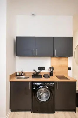 Cuisine ou kitchenette dans l'établissement L'Opéra 2 - RDC - Joli studio Hôtel de Ville