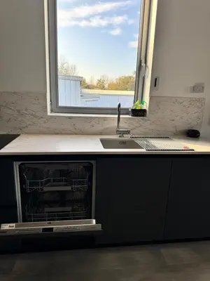 Cuisine ou kitchenette dans l'établissement Loft épuré avec parking privé.
