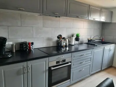 Cuisine ou kitchenette dans l'établissement Logement Confortable dans résidence privée à Amplepuis