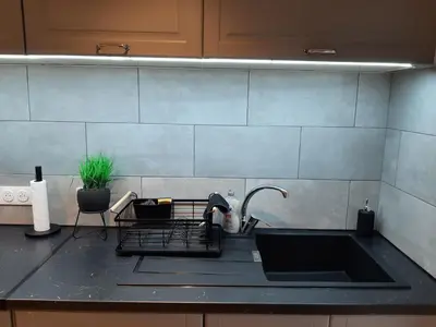 Cuisine ou kitchenette dans l'établissement Logement Confortable dans résidence privée à Amplepuis