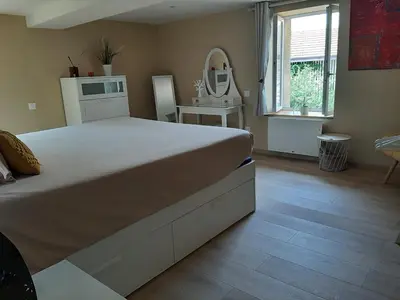 Un ou plusieurs lits dans un hébergement de l'établissement Logement Confortable dans résidence privée à Amplepuis