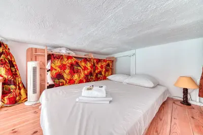 Un ou plusieurs lits dans un hébergement de l'établissement GuestReady - Loft Chic no 7º Arr.