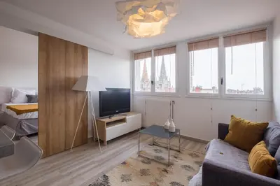 Télévision ou salle de divertissement dans l'établissement HONORÊ SUITE SAINT ANTOINE