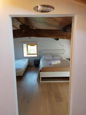 Un ou plusieurs lits dans un hébergement de l'établissement La cambuse des gones - Gîte 3 chambres