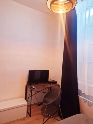 Coin salon dans l'établissement appartement cosy en centre ville avec terrasse