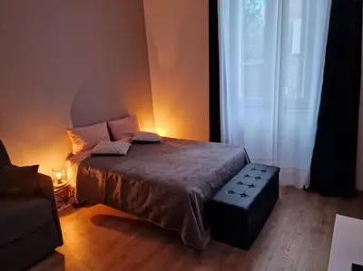 Un ou plusieurs lits dans un hébergement de l'établissement appartement cosy en centre ville avec terrasse