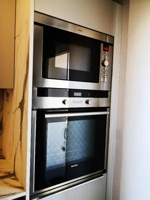 Cuisine ou kitchenette dans l'établissement Petit Paradis Cosy T1 Bis 40m2 Indépendent Studio en Maison avec Jardin & Parking Gratuit