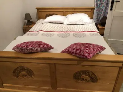 Un ou plusieurs lits dans un hébergement de l'établissement LE CHALET de la goutte